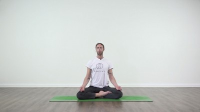 Yoga practice at Yogateket with Guy Powiecki sitting in Padmasana