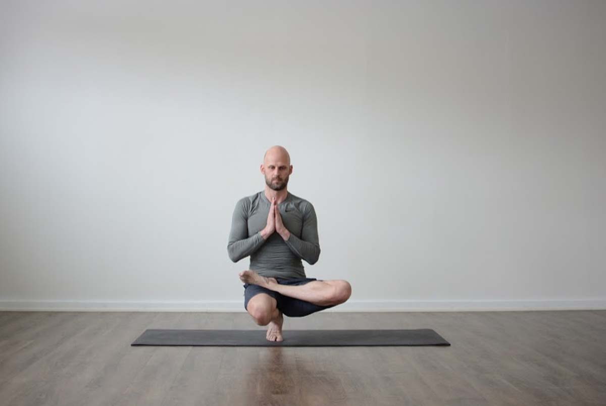 Toe stand pose - Padangustasana